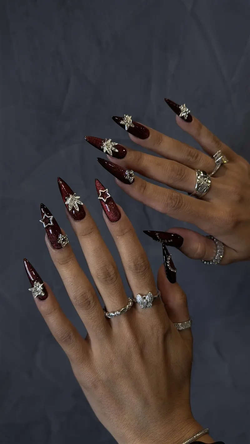 Burgundy stilettos with star charms
